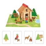 contenu et cabane montée de la boîte de jeu la cabane de montagne de la marque jeujura monté sur tapis de jeu